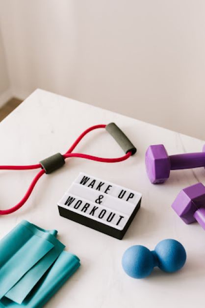 A pair of small dumbbell and some other exercising tools