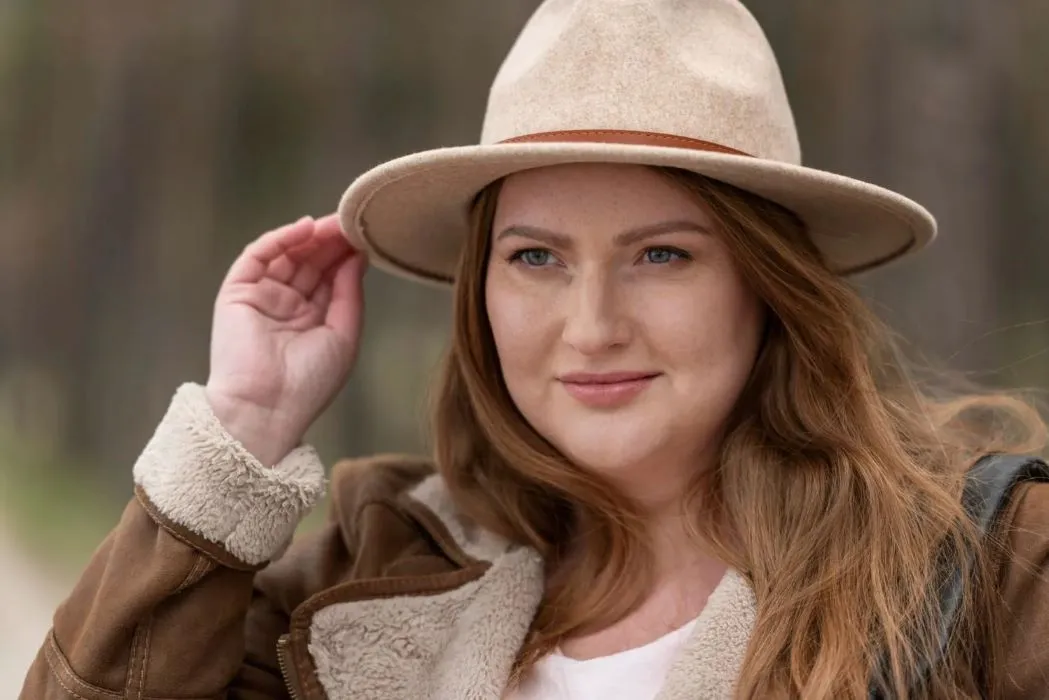 Close up a woman wearing hat in sunny day